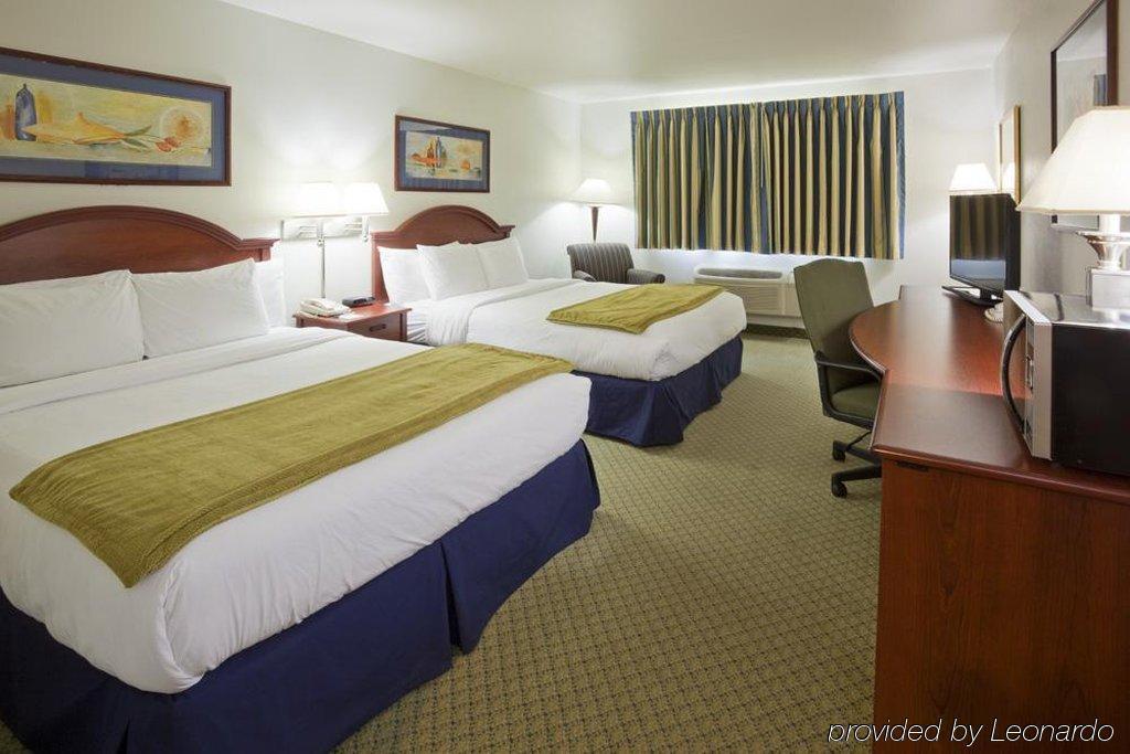 Crossings By Grandstay Inn & Suites Becker Экстерьер фото