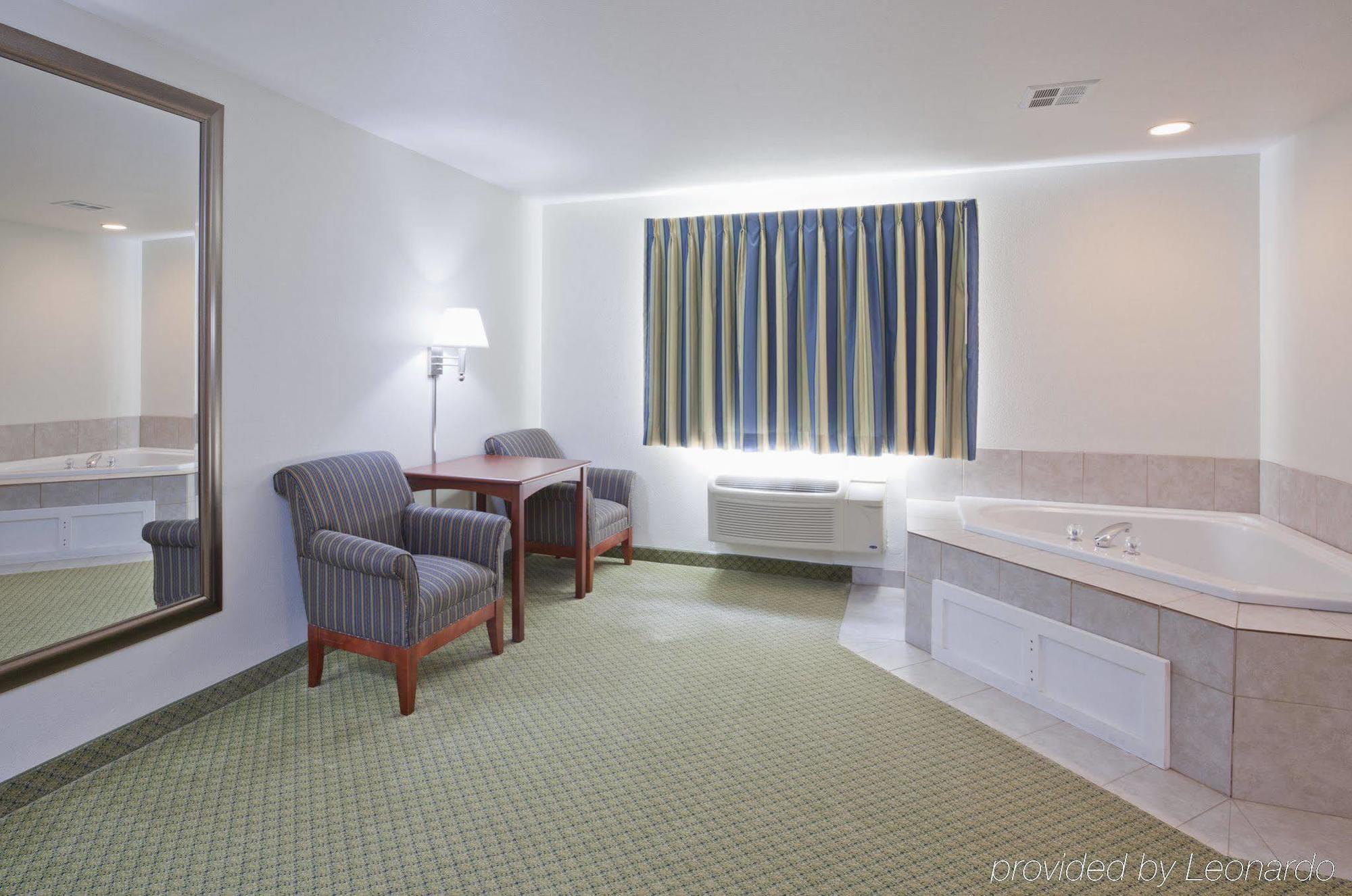 Crossings By Grandstay Inn & Suites Becker Экстерьер фото